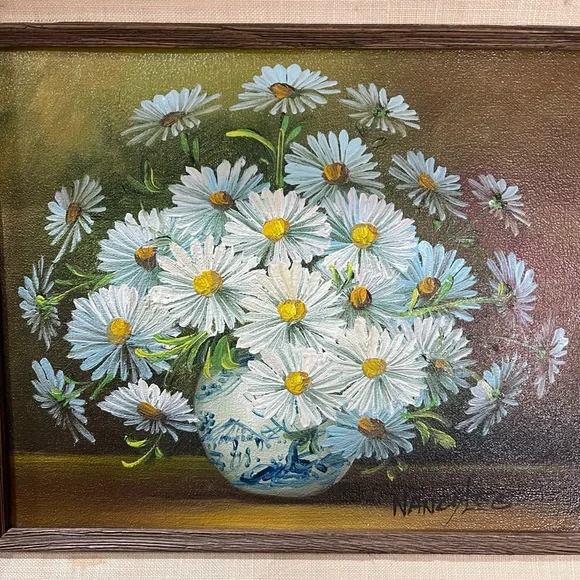 Original oil painting of daisies in a vase signed by the artist Nancy Lee